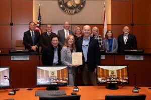 VBMA officials accepting a proclamation in the Indian River County Commission chambers